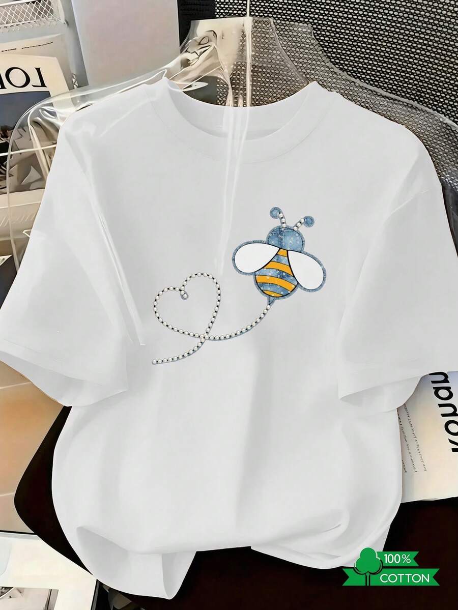 Camisa casual de vacaciones para mujer con estampado de letras y anime a la moda, camiseta de cuello redondo para mujer con diseño sencillo, cómoda y transpirable, elegante y versátil, adecuada para deportes y ocio, un imprescindible de verano, enviada localmente. Camiseta de mezclilla Bee de talla grande, adecuada para salidas, uso urbano y cotidiano. - Blanco - Ver 1