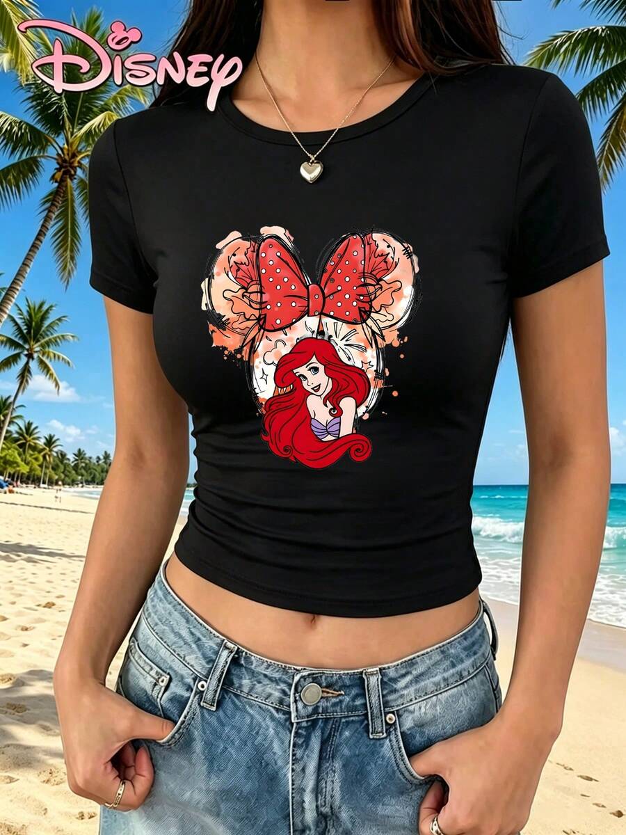 [Disney Official Authorization] Disney Women's T-Shirt, Print Features Ariel, Styled With Minnie's Polka-Dot Bow And Orange-Red Splatter Background. - Black - View 1
