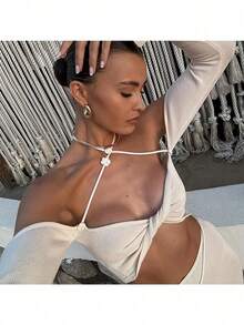 Conjunto de top corto y falda de punto acanalado de manga larga con cuello halter para mujer, estilo casual con tejido ligeramente elástico, pareo ajustado blanco. - Blanco - Ver 3