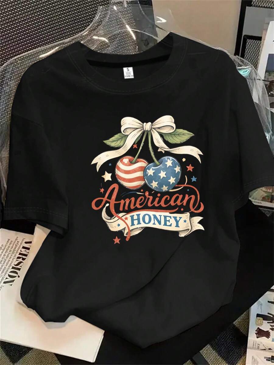 Top de mujer de manga corta y cuello redondo con estampado de manzanas y miel, apto para todas las estaciones. - Negro - Ver 1