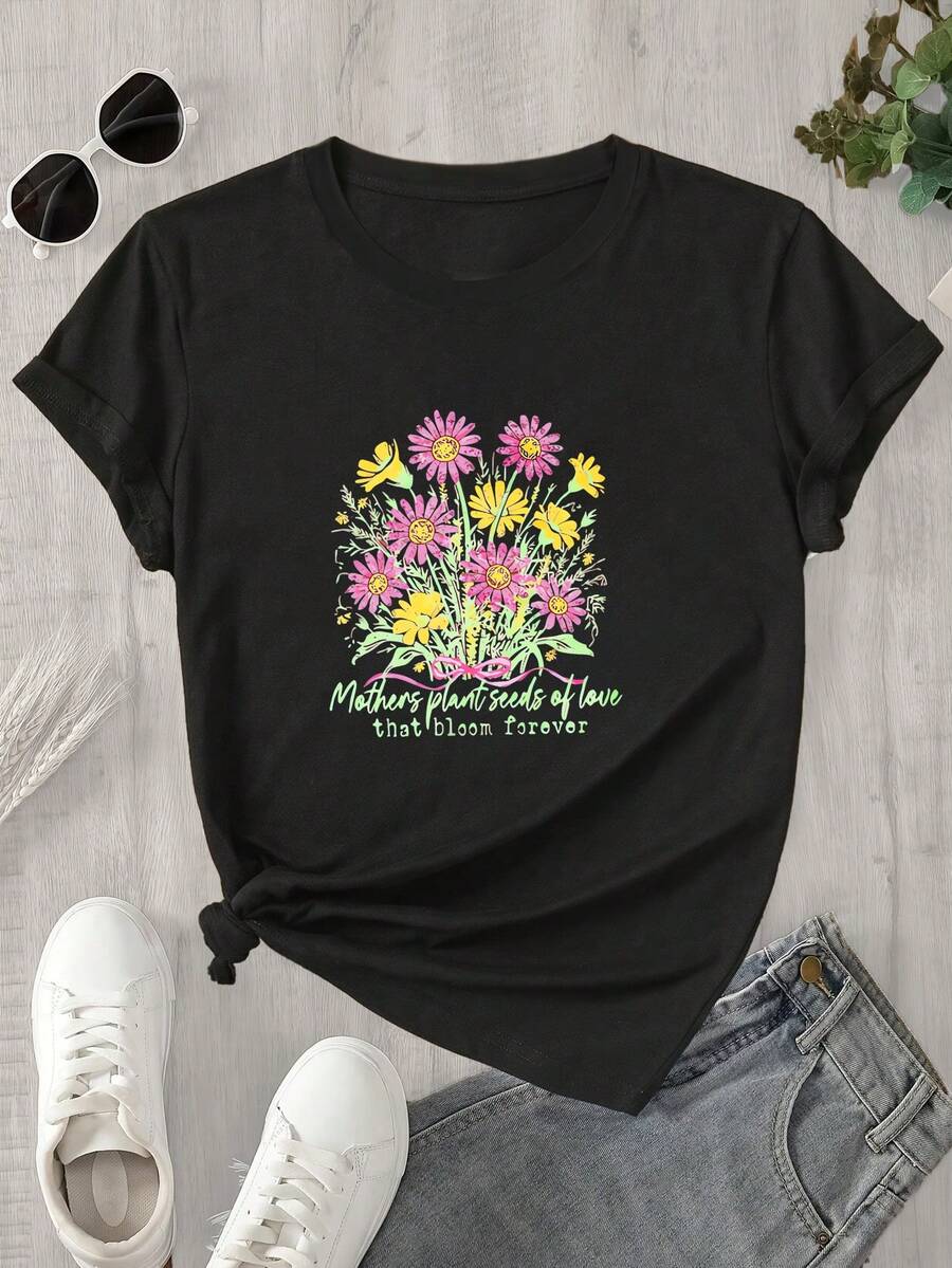 Top de mujer de manga corta y cuello redondo con estampado floral rosa y amarillo, apto para todas las estaciones. - Negro - Ver 1