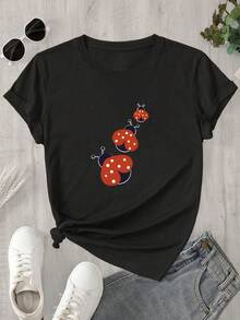 Top de mujer de manga corta y cuello redondo con un estampado de 3 pequeños insectos, ideal para todas las estaciones. - Negro - Ver 1
