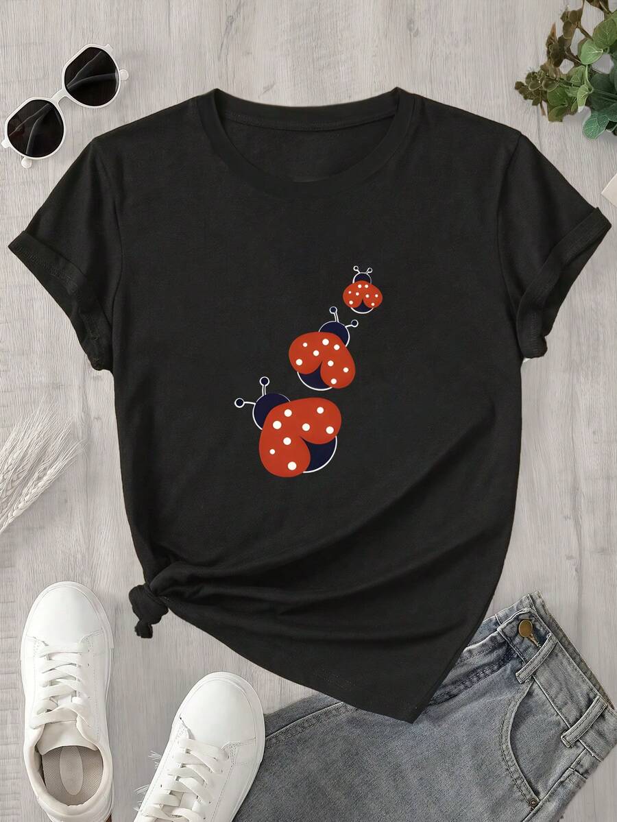 Top de mujer de manga corta y cuello redondo con un estampado de 3 pequeños insectos, ideal para todas las estaciones. - Negro - Ver 1