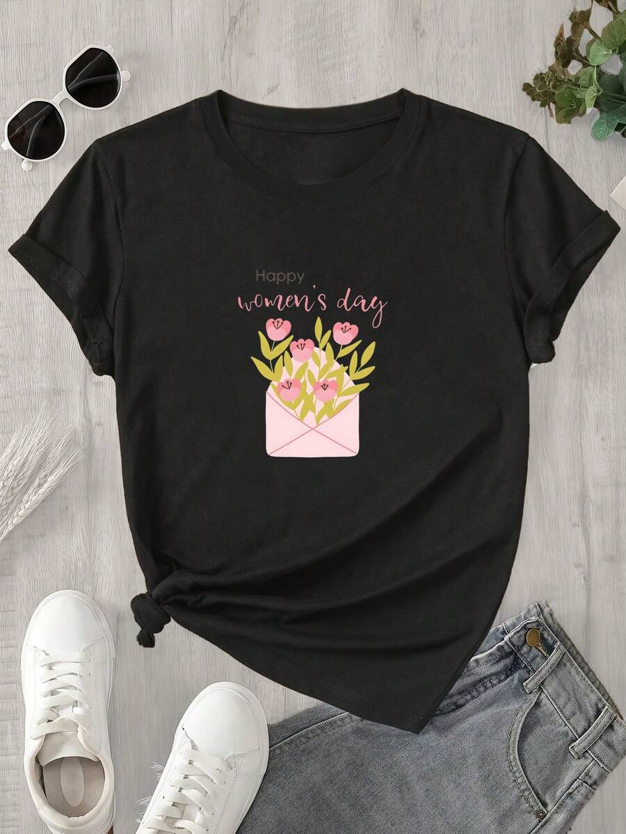 Jersey rosa de manga corta y cuello redondo para mujer, con estampado floral y mensaje "Feliz Día de la Mujer", apto para todas las estaciones. - Negro - Ver 1