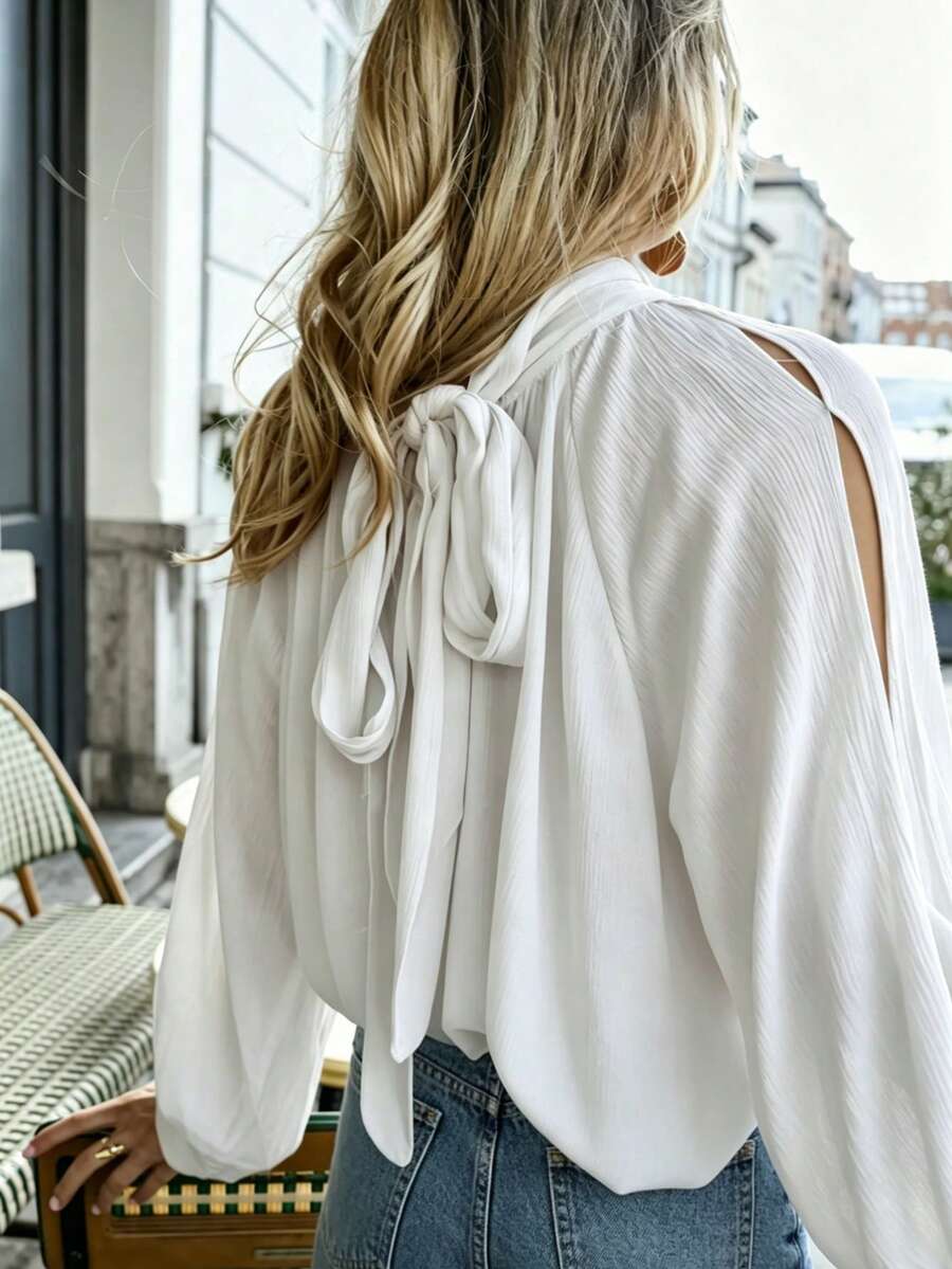 Elegante camisa tipo capa de mujer blanca con cuello alto y manga larga, diseño con lazo en la espalda, blusa de poliéster de corte holgado, adecuada para primavera y otoño - Blanco - Ver 1