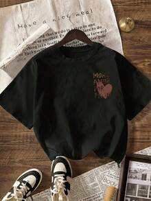 1 Piece, 100% Cotton. Loose-Fitting 100% Cotton T-Shirt, Short-Sleeved Summer T-Shirt With A Round Neck. Leopard Print. Brown Heart Graphic T-Shirt With "More Amor Por Favor." Summer Outfits For Women, Vacation Wear, Casual Women's Short-Sleeved T-Shirt With A Round Neck, Summer Tops. - 黑色 - 查看 2
