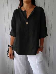Blusa de tejido con cuello en pico y detalles de botones, corte relajado para primavera - Negro - Ver 1