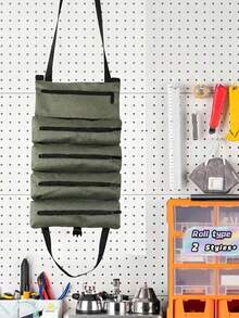 Bolsa de herramientas enrollable resistente y práctica, con múltiples compartimentos, un asa, una correa ajustable para el hombro y cierre con cremallera. Portátil y práctica, puede almacenar eficientemente varias herramientas manuales y accesorios. - Bolsa para guardar herramientas - Ver 5
