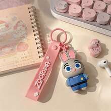 Miniso 迪士尼動物方舟朱蒂兔粉色矽膠鑰匙圈，柔軟觸感卡通包飾，可愛極簡手提包吊飾，旅行行李箱吊牌配件，汽車鑰匙扣裝飾，日常攜帶禮物 - 樣式 1 - 查看 6