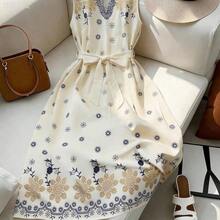 xuehuamaoyi02  Vestido de mujer con estampado, cuello en V, sin mangas y cintura ceñida, con estilo elegante y de vacaciones a la francesa - Albaricoque - Ver 8