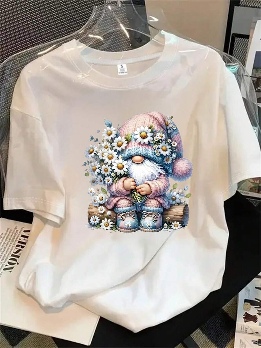Camisa de manga corta con cuello redondo para mujer: Una camisa de manga corta con un estampado de un enano que representa una mano sosteniendo una flor, adecuada para todas las estaciones. - Blanco - Ver 1