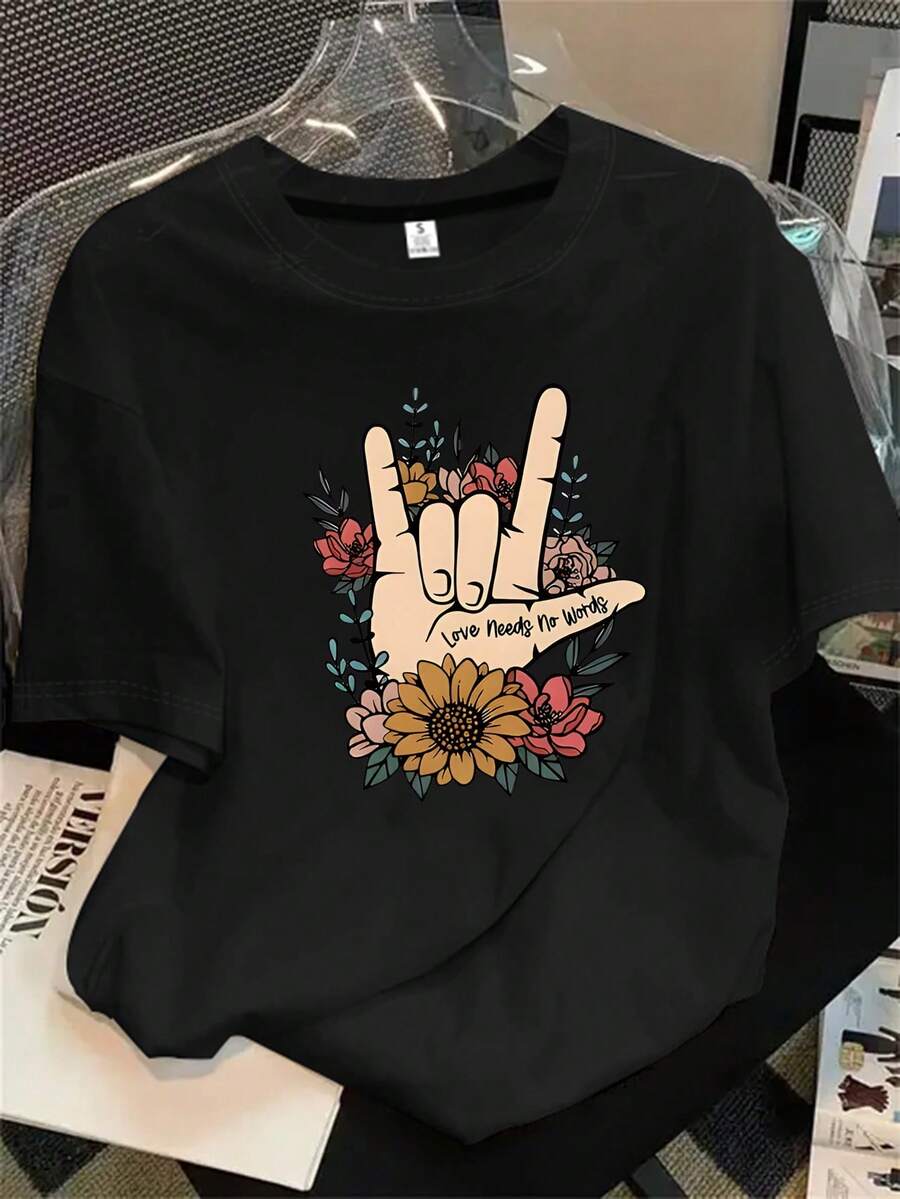 Camiseta de manga corta con cuello redondo para mujer, con símbolos de la paz y flores, estampado en las mangas cortas, apta para todas las estaciones. - Negro - Ver 1