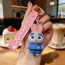 Miniso 迪士尼動物方舟朱蒂兔粉色矽膠鑰匙圈，柔軟觸感卡通包飾，可愛極簡手提包吊飾，旅行行李箱吊牌配件，汽車鑰匙扣裝飾，日常攜帶禮物 - 樣式 1 - 查看 4