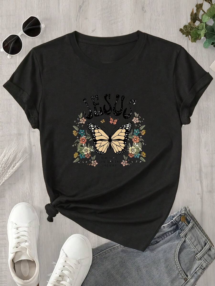Top de mujer de manga corta y cuello redondo con estampado de mariposas y Jesús, apto para todas las estaciones. - Negro - Ver 1