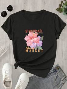 Top de mujer de manga corta y cuello redondo con estampado floral, ideal para todas las estaciones. - Negro - Ver 1