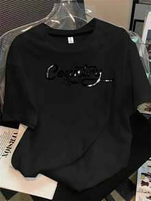 Top de mujer de manga corta y cuello redondo con estampado de camino rural en tinta sobre el fondo, apto para todas las estaciones. - Negro - Ver 1