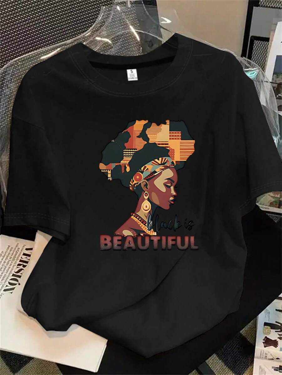 Camisa de manga corta negra con cuello redondo para mujer, con estampado de cabeza de mujer y letras negras, ideal para todas las estaciones. - Negro - Ver 1