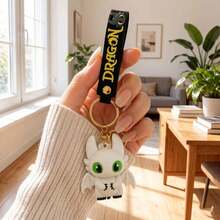MINISO How To Train Your Dragon Light Fury White Dragon Keychain, Cute Mini Dragon Figurine Bag Charm With Black Lettering Webbing And Metal Key Ring, Backpack Handbag Car Key Accessory, Back To School Gift - Style 1 - View 1