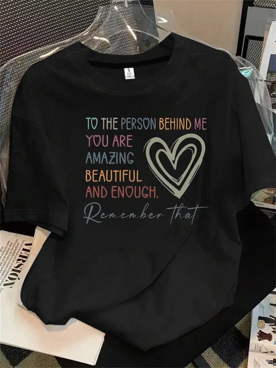 Top de manga corta con cuello redondo para mujer. Un top de manga corta precioso y con un estampado sutil, ideal para cualquier estación del año. - Negro - Ver 1