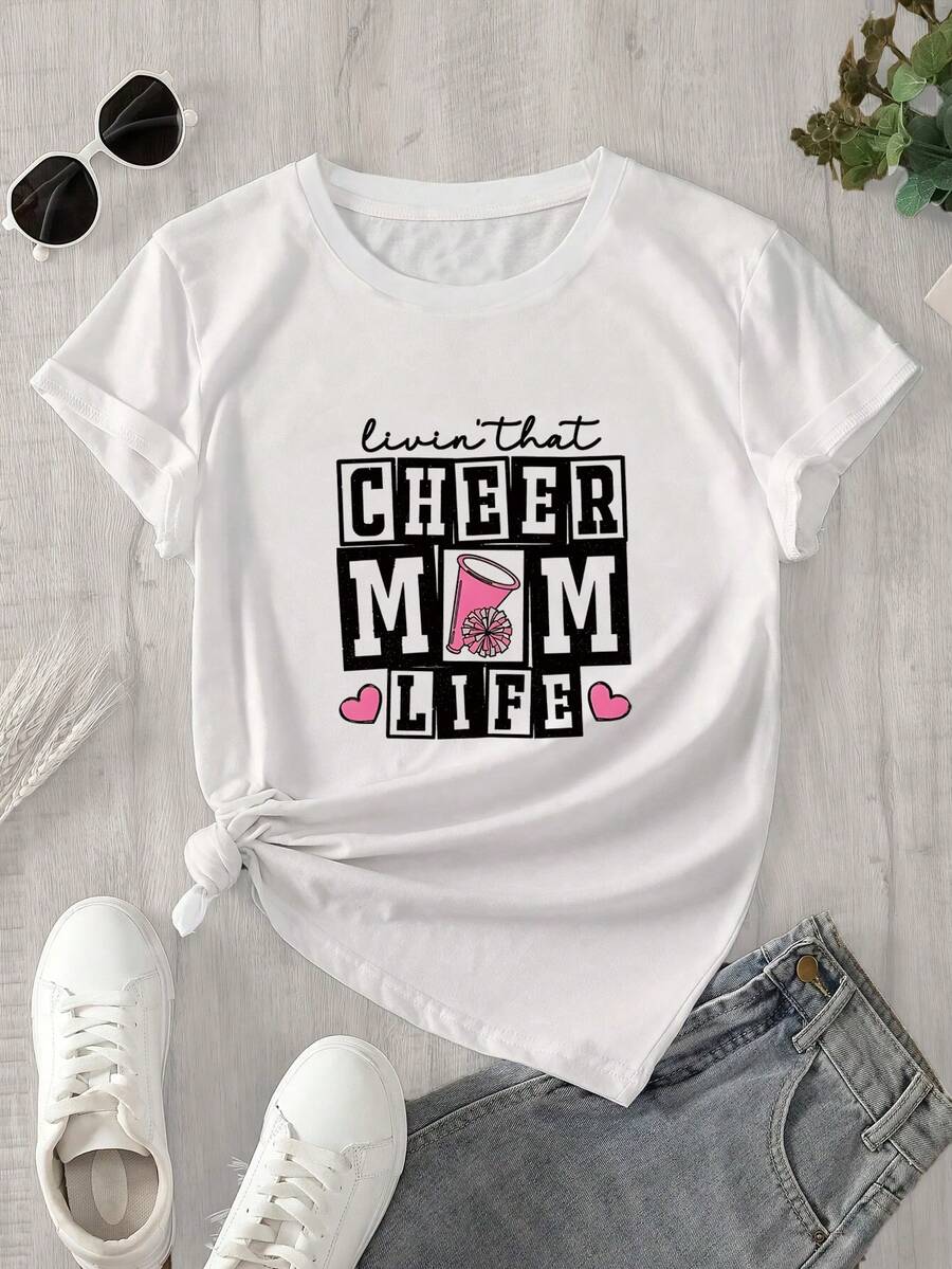 Camiseta de manga corta y cuello redondo para mujer con un estampado que dice "Celebrando la vida de mamá", apta para todas las estaciones. - Blanco - Ver 1