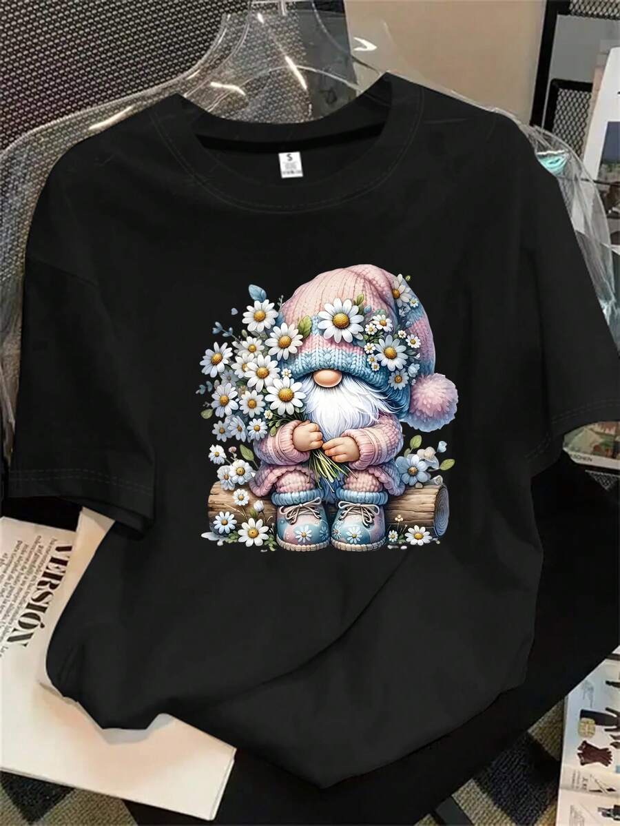 Camisa de manga corta con cuello redondo para mujer: Una camisa de manga corta con un estampado de un enano que representa una mano sosteniendo una flor, adecuada para todas las estaciones. - Negro - Ver 1