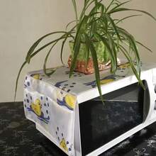 Funda antipolvo impermeable para refrigerador con bolsillos de almacenamiento laterales, protector para la parte superior del refrigerador, organizador de cocina - Ver 10