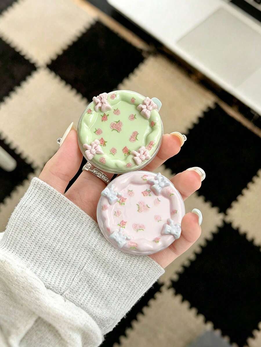 奶油色蝴蝶结手机支架，ABS材质，可折叠便携，饰有柔和色调的凸起花朵图案，装饰性手机支架，操作简便，支撑力强，可爱手机支架 - 彩色 - 查看 1