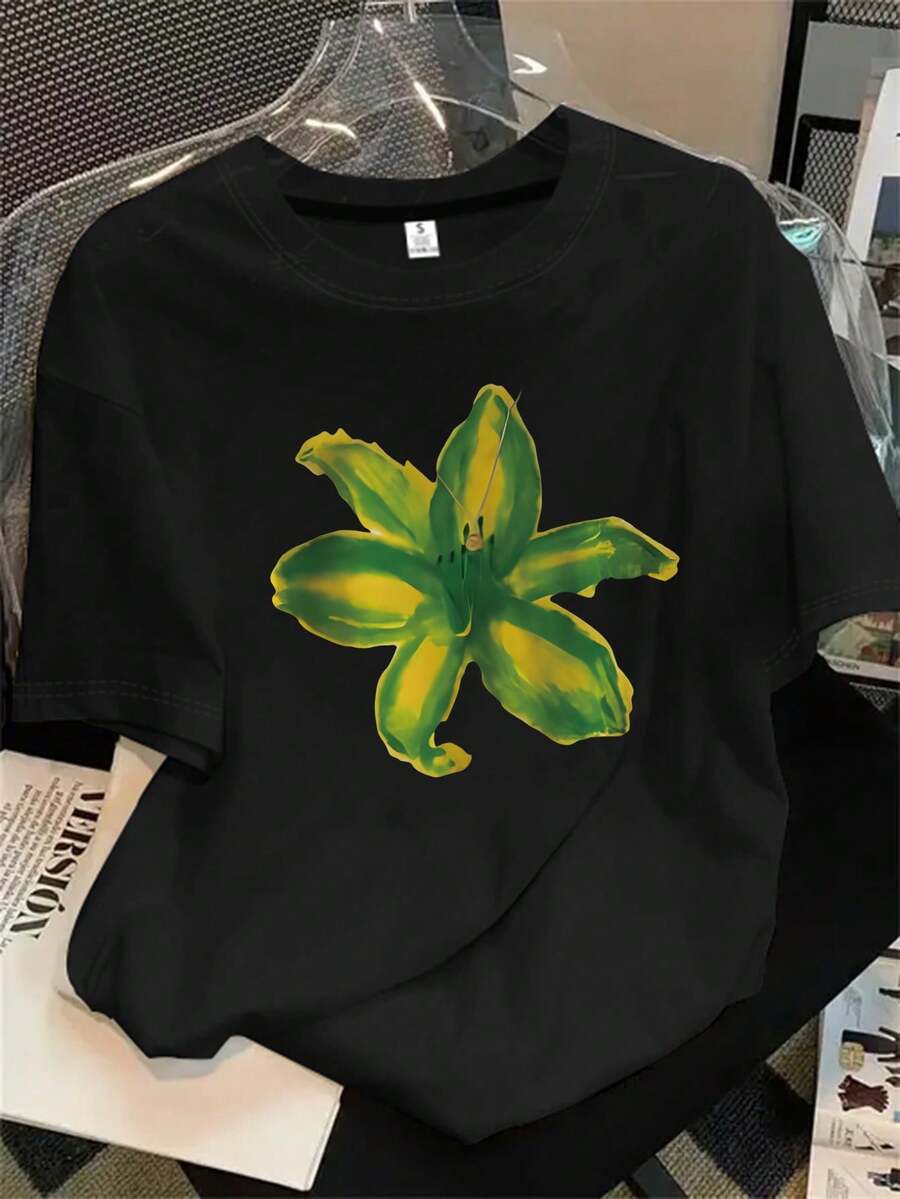 Top de mujer de manga corta y cuello redondo con estampado floral verde y amarillo, apto para todas las estaciones. - Negro - Ver 1