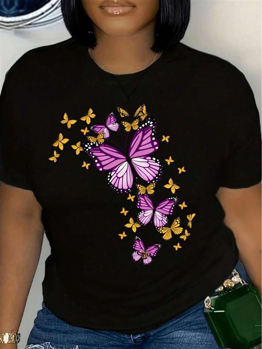 TrendyTalla Grande - Talla Grande - Camiseta negra de manga corta para mujer de talla grande con estampado de mariposas, perfecta para uso diario casual y estilo urbano, top holgado de verano.Everyday Wear - Negro - Ver 1