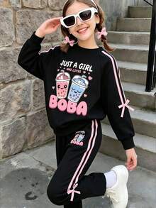 Conjunto de sudadera y pantalón de chándal con estampado de dibujos animados para niña preadolescente - Negro - Ver 1