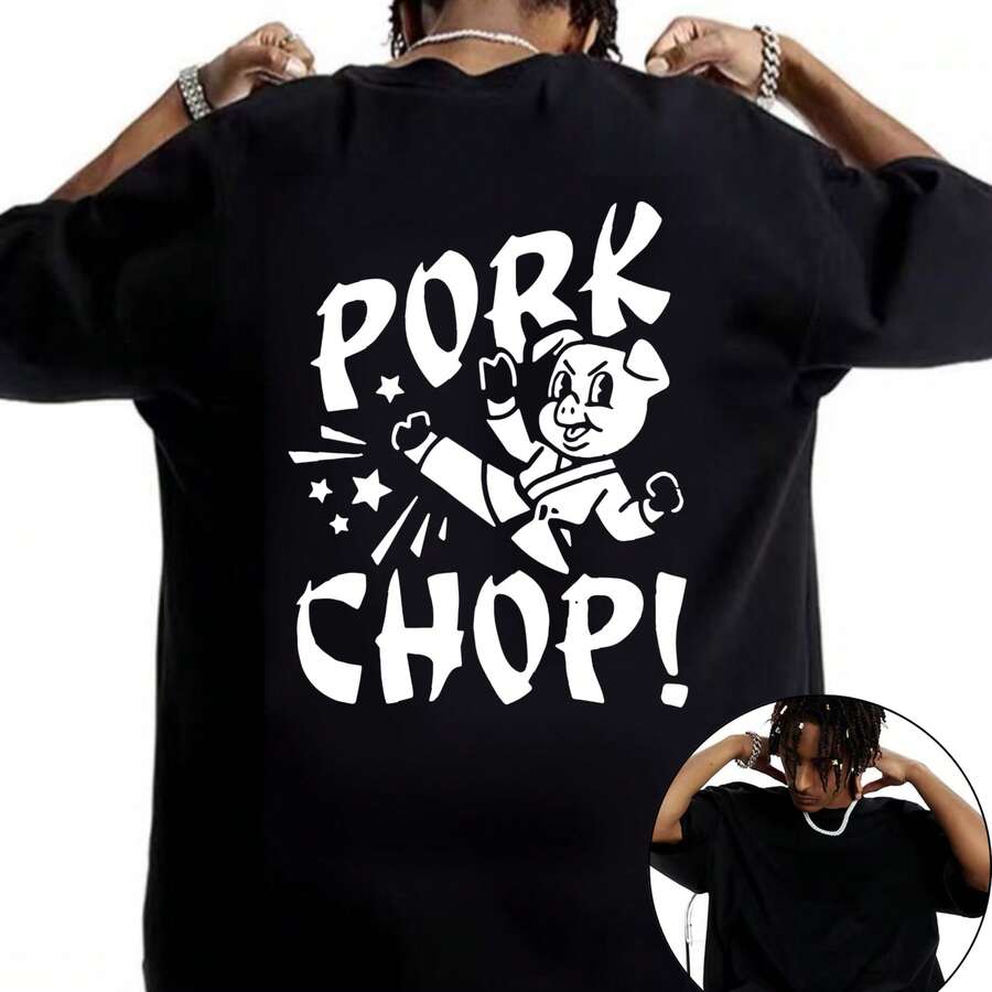 White Printed T-Shirt With A Stylized Pig Motif And The Text PORK CHOP In Bold Black Letters, Accompanied By Stars And Dynamic Effects For A Humorous And Casual Look, Ideal For