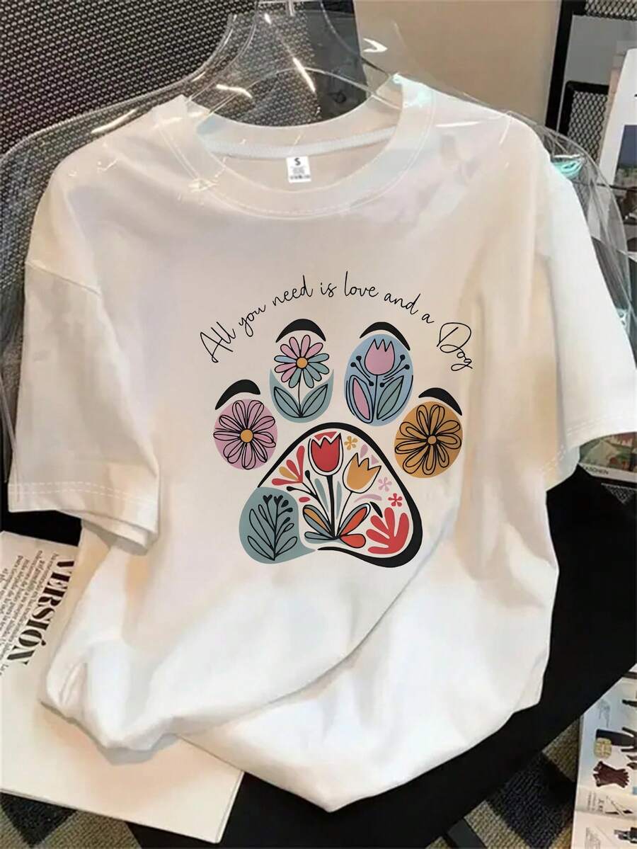 Camiseta de manga corta con cuello redondo para mujer, con estampado de huellas de perro, flores y palabras. Todo lo que necesitas es una camiseta de manga corta con estampado romántico, ideal para cualquier estación del año. - Blanco - Ver 1