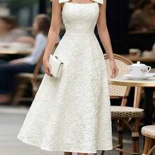 jianchaimaoyi02  Vestido de tela jacquard con textura de loto albaricoque con tirantes, decoración de lazo grande, cintura ceñida, falda acampanada, elegante y grácil, adecuado para regalo de cumpleaños, cita, fiesta, Día del Trabajo, Pascua, boda en el jardín, viaje, casual, trabajo, reunión, Día del Maestro, primavera y verano - Albaricoque - Ver 2