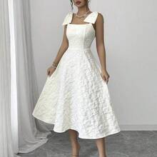 jianchaimaoyi02  Vestido de tela jacquard con textura de loto albaricoque con tirantes, decoración de lazo grande, cintura ceñida, falda acampanada, elegante y grácil, adecuado para regalo de cumpleaños, cita, fiesta, Día del Trabajo, Pascua, boda en el jardín, viaje, casual, trabajo, reunión, Día del Maestro, primavera y verano - Albaricoque - Ver 7