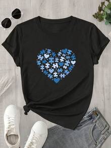Esta blusa de manga corta y cuello redondo para mujer presenta un diseño estampado inspirado en un rompecabezas, ideal para todas las estaciones. - Negro - Ver 1