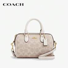 Coach حقيبة يد روان18 كلاسيكية بنقشة المونوغرام مع إغلاق بسحاب من قماش البولي فينيل كلوريد مع حواف جلدية حقيبة كتف وحقيبة كروس بودي للنساء باللون الأبيض الفانيليا حقيبة بوسطن CW329-IMXDM - ألوان الباستيل - مشاهدة 1