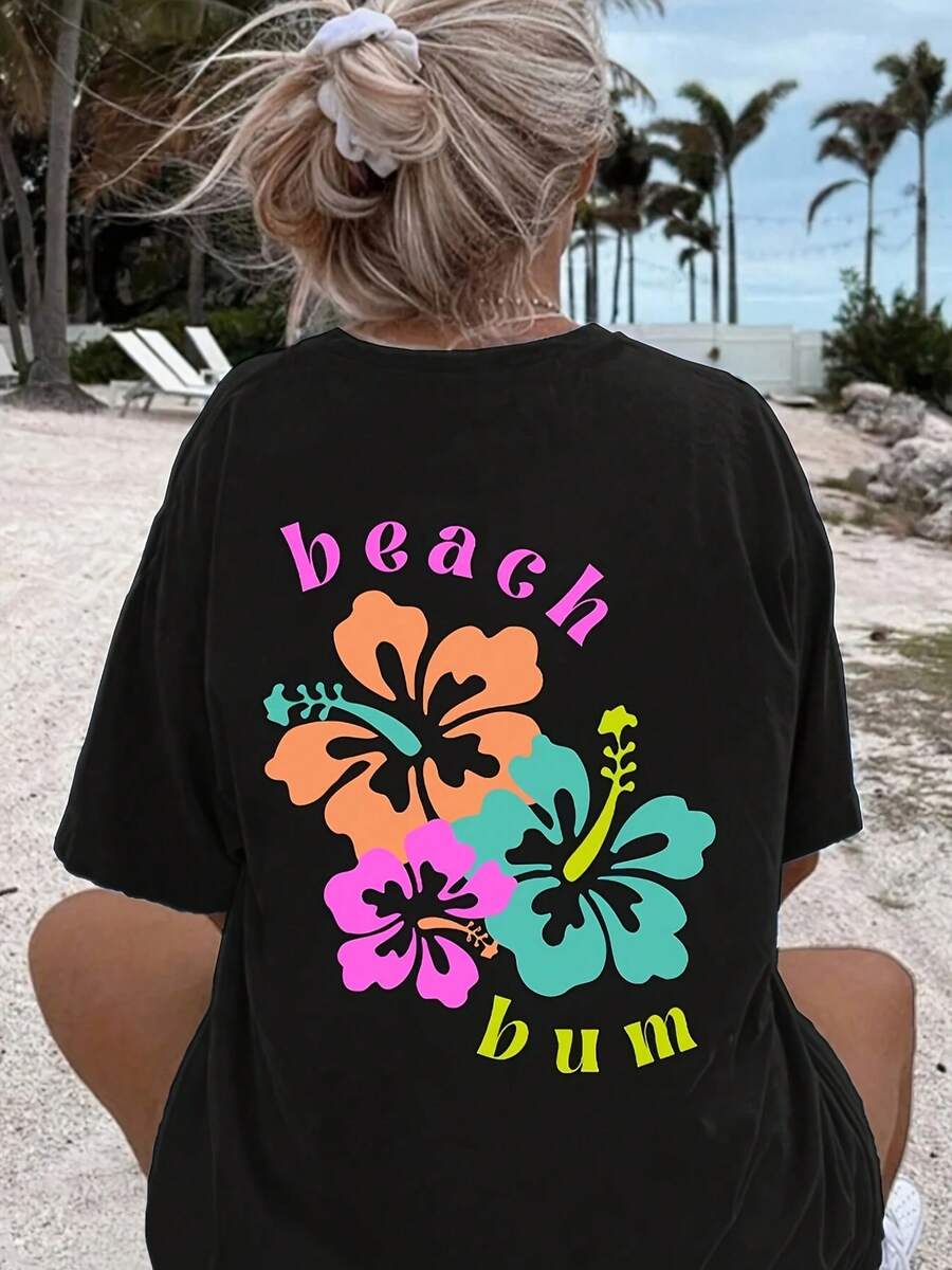 Camiseta veraniega colorida camiseta de playa diseño vibrante flores tropicales estilo casual cómodo ideal para verano playa vacaciones tallas disponibles negro  moda - Negro - Ver 1