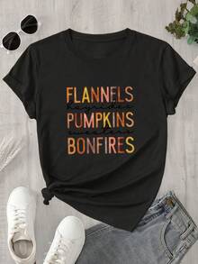 Camiseta de manga corta con cuello redondo para mujer, con estampado de llamas, calabazas y fogatas, apta para todas las estaciones. - Negro - Ver 1
