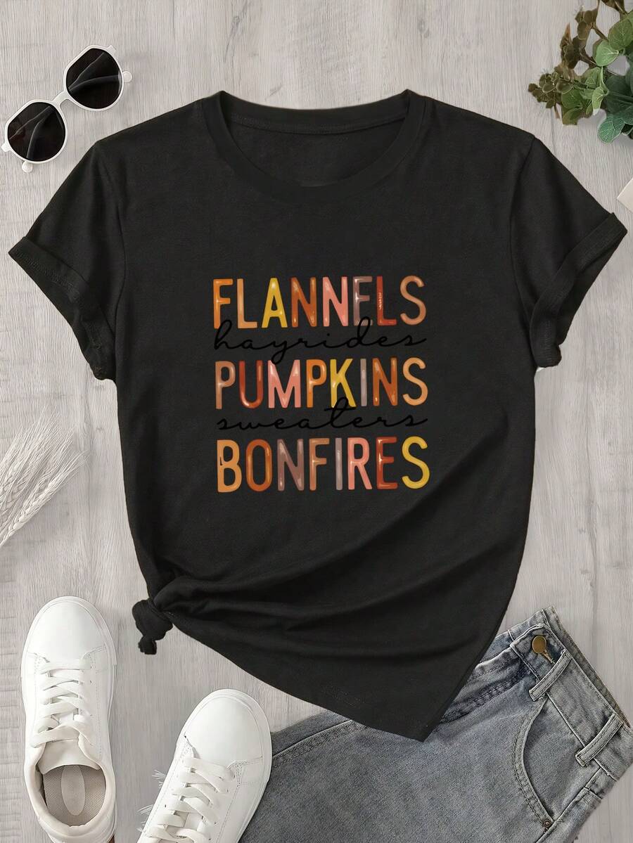 Camiseta de manga corta con cuello redondo para mujer, con estampado de llamas, calabazas y fogatas, apta para todas las estaciones. - Negro - Ver 1