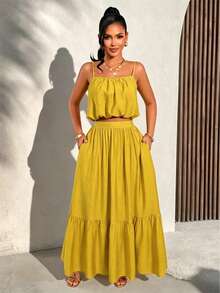 AIJ Amarilo Elegant Women 2 Pieces Set: Spaghetti Strap Crop Top And Pleated Mini Skirt, Backless Design, Suitable For Summer Vacation, Beach And Festivals - Mustard Yellow - View 1