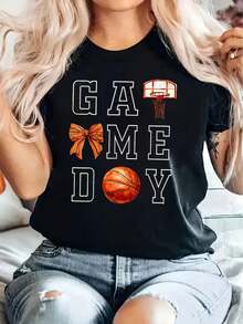 Camiseta estampada para mujer con diseño de baloncesto para el día del partido, negra, casual, de cuello redondo y manga corta, con diseño naranja y blanco, perfecta para primavera y verano. - Negro - Ver 1