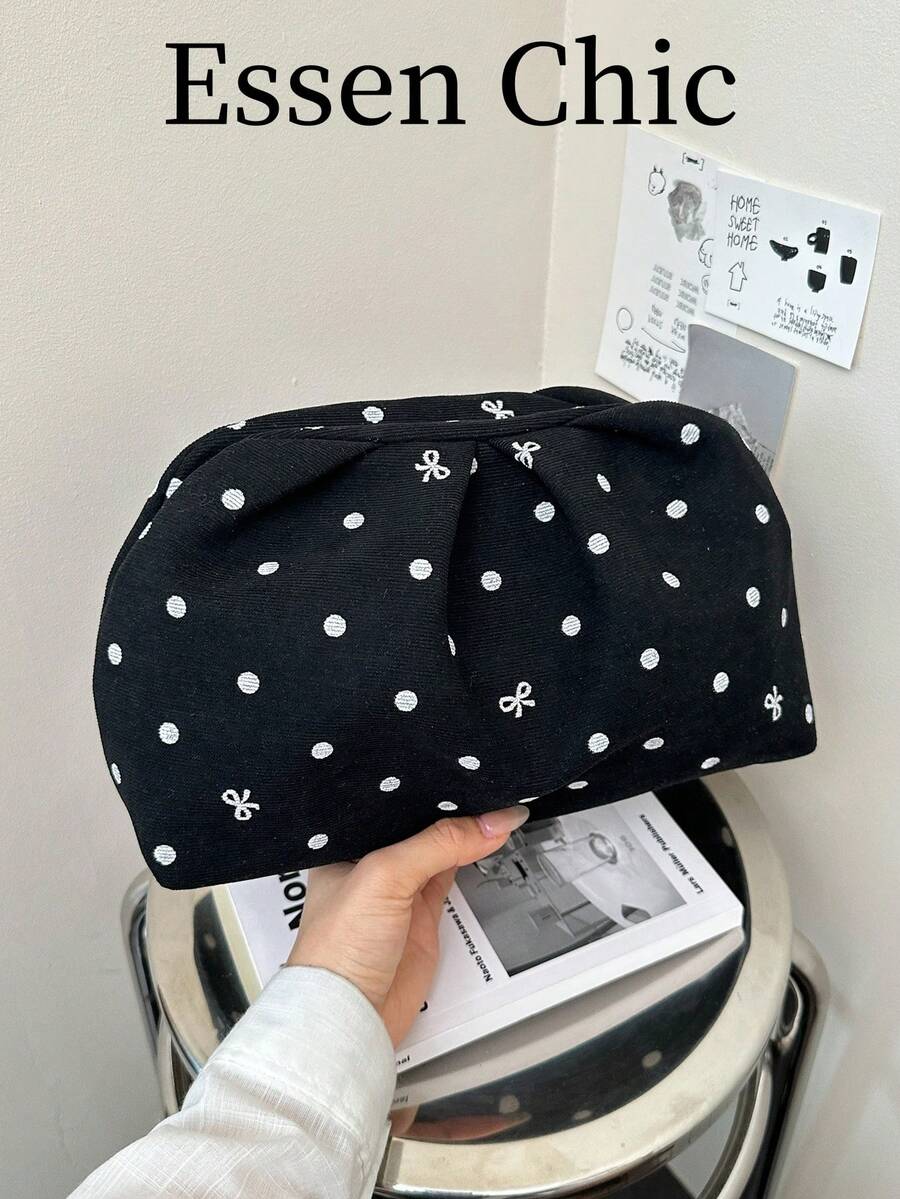 1件黑色夏季新款印花波點蝴蝶結裝飾尼龍壓褶女士晚宴手拿包