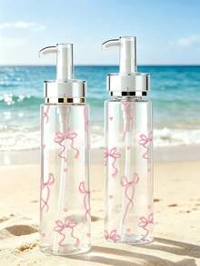 蝴蝶結紋理透明壓式壓克力乳液分裝瓶，提供100ml、120ml、150ml、200ml多種尺寸。瓶身由透明塑料材質製成，適用於分裝水性乳液、各種化妝品和化妝水，是旅行和出差的理想便攜容器。 - 彩色 - 查看 3