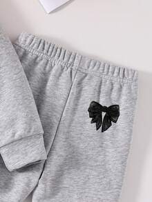 Småbarns sweatshirt med rosettmönstrat tryck, rund hals och utsvängda byxor - Grå - Visa 5