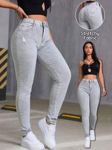 Jeans ajustados para mujer con roturas y diseño que realza la figura - Gris Claro - Ver 1