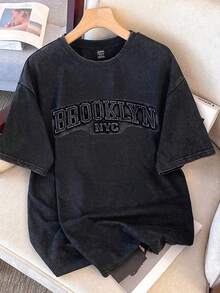 Camiseta de mujer con diseño estampado de estilo vintage lavado. - Negro 2 - Ver 1
