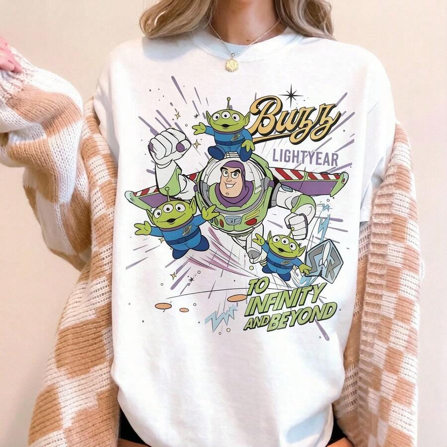 Unisex Disney Baumwoll-T-Shirt With "Buzz Lightyear" Print, Der Space Ranger With Alien And "To Infinity And Beyond" Schriftzug Im Dynamischen De - 白色 - 查看 1