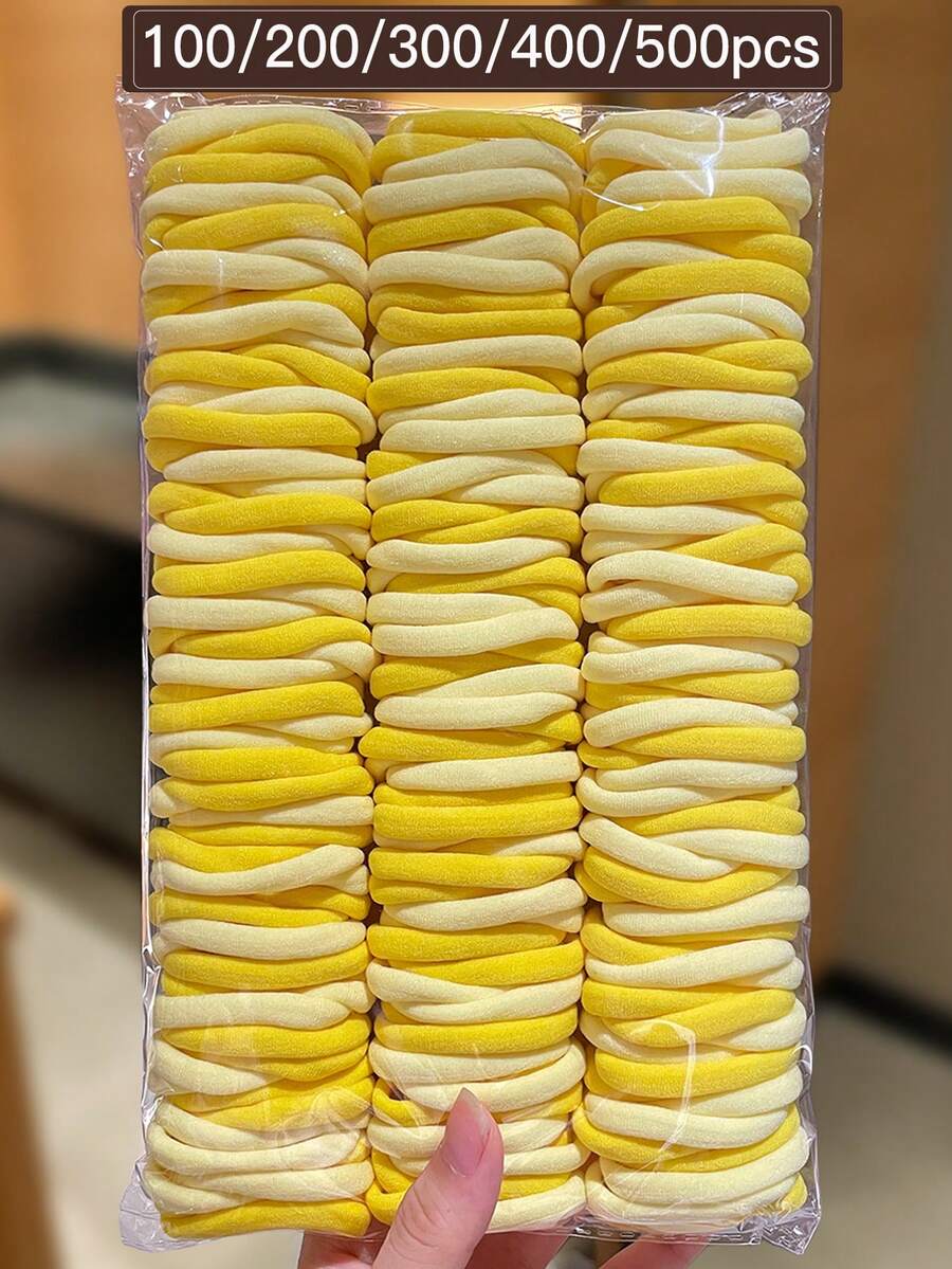 500/400/300/200/100条装黄色简约发圈，高弹力发带，百搭休闲风，女士发饰，适合扎马尾辫和编发。适合日常休闲佩戴和外出，四季皆宜，也是学习用品和女士配饰。