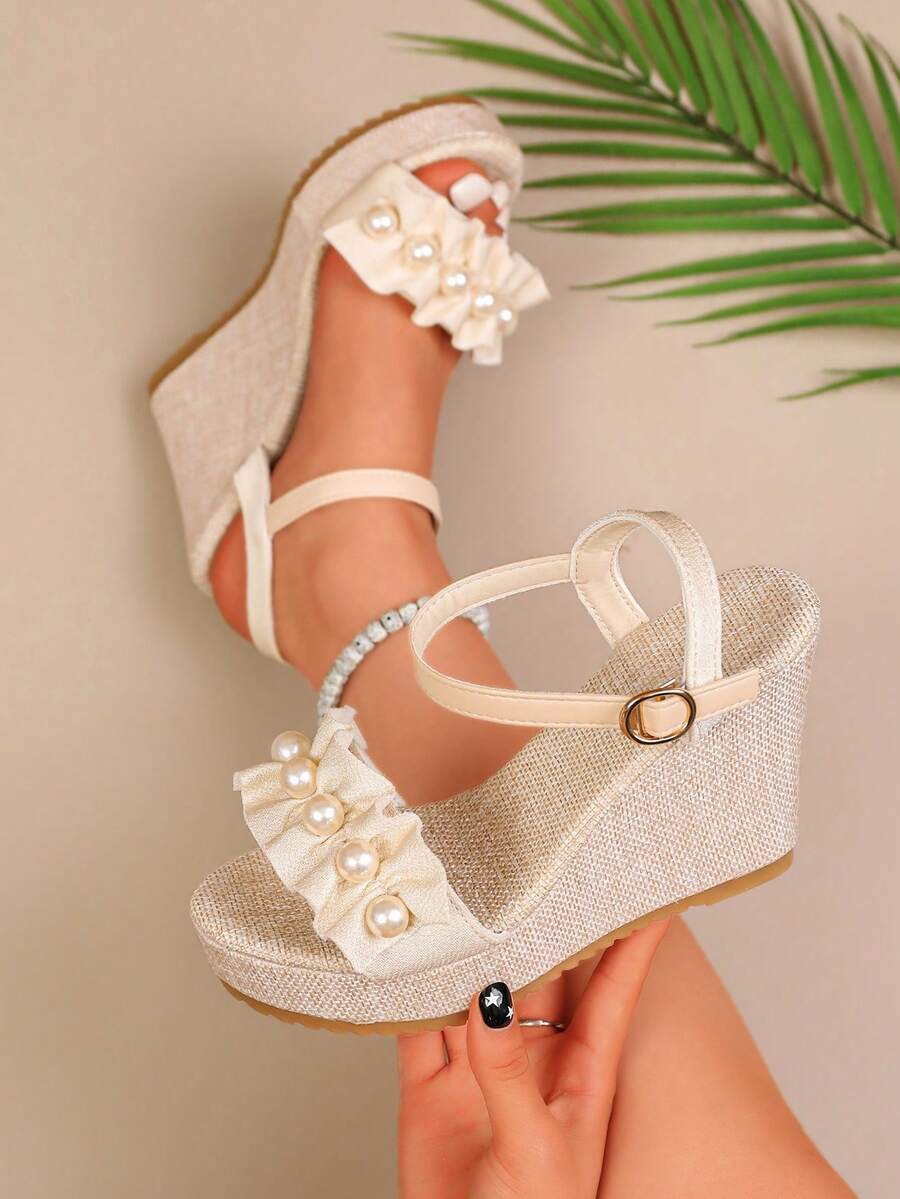 2026 Mùa hè Mới Sandal gót đế xuồng một quai khóa cài, Sandal đế dày phong cách Pháp thanh lịch đa năng đính ngọc trai, Phong cách công chúa thời trang đi nghỉ dưỡng - Màu be - Xem 1