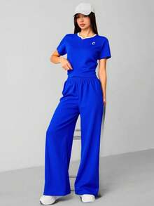 Conjunto Casual de Mujer de 2 Piezas Estilo Casual Chic en Poliéster con Top de Manga Corta y Pantalón Palazzo de Pierna Ancha | Outfit Cómodo para Uso Diario, Viajes y Primavera-Verano - Azul - Ver 2